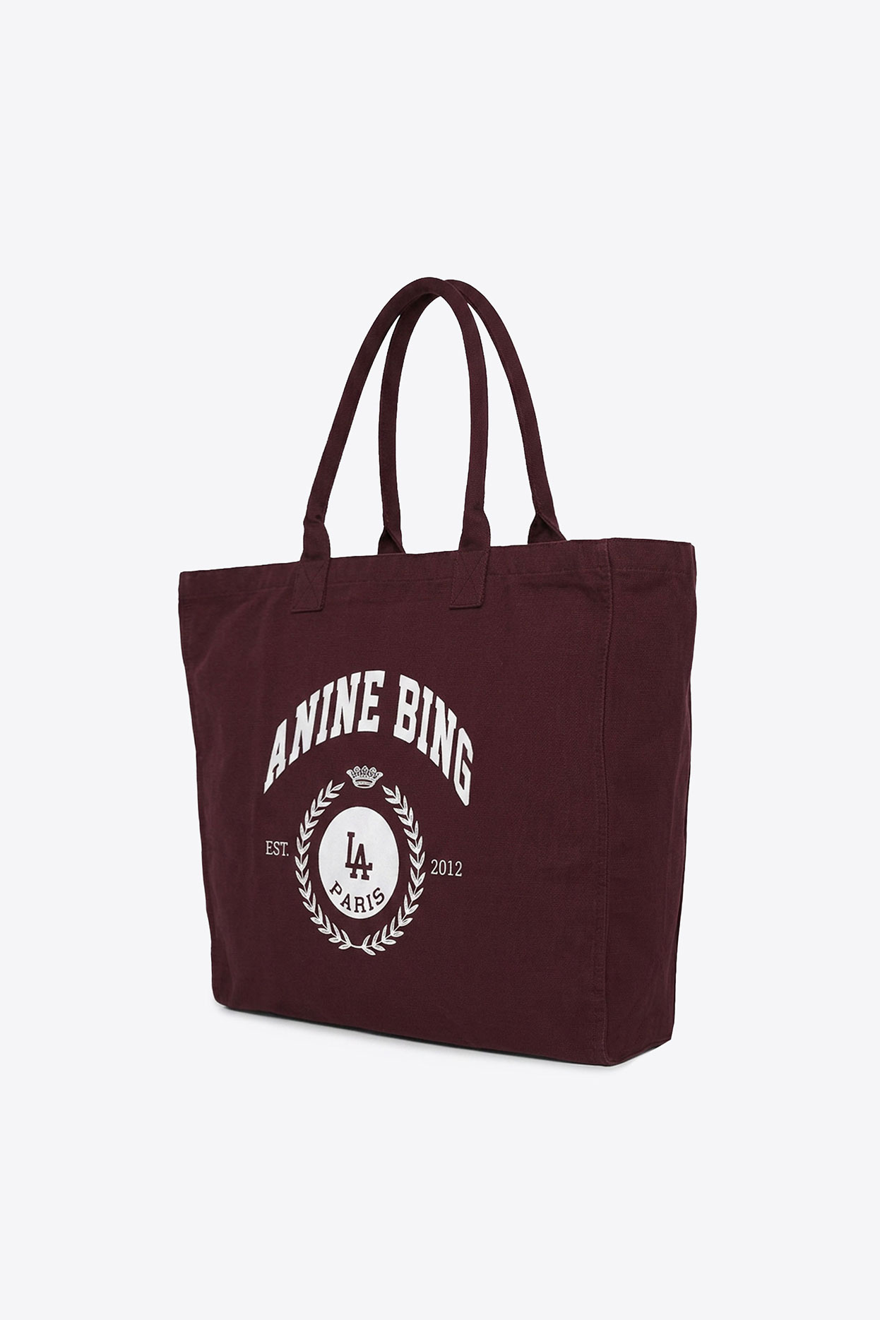 Cabas Leo Anine Bing en toile bordeaux logo blanc « ANINE BING » sérigraphie esprit collège vue de profil.