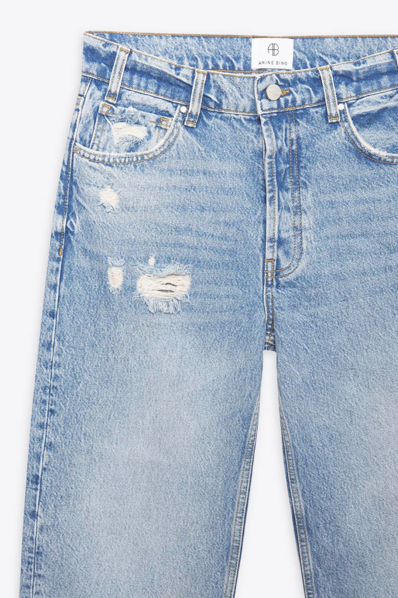 Jean droit Gavin bleu Anine Bing en denim bleu clair &laquo; Blue Reservoir &raquo;. D&eacute;tail du d&eacute;lavage us&eacute;.