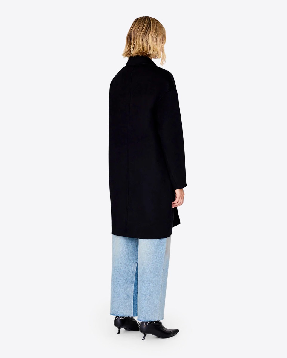 Manteau Portia Anine Bing en laine et cachemire double face noir porté de dos.