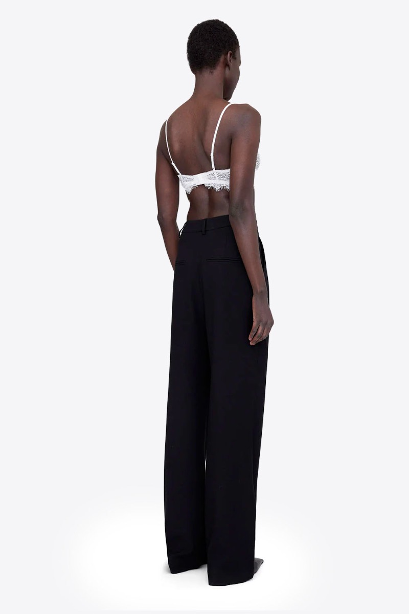Soutien-gorge triangle en dentelle ivoire Anine Bing. Porté dos.