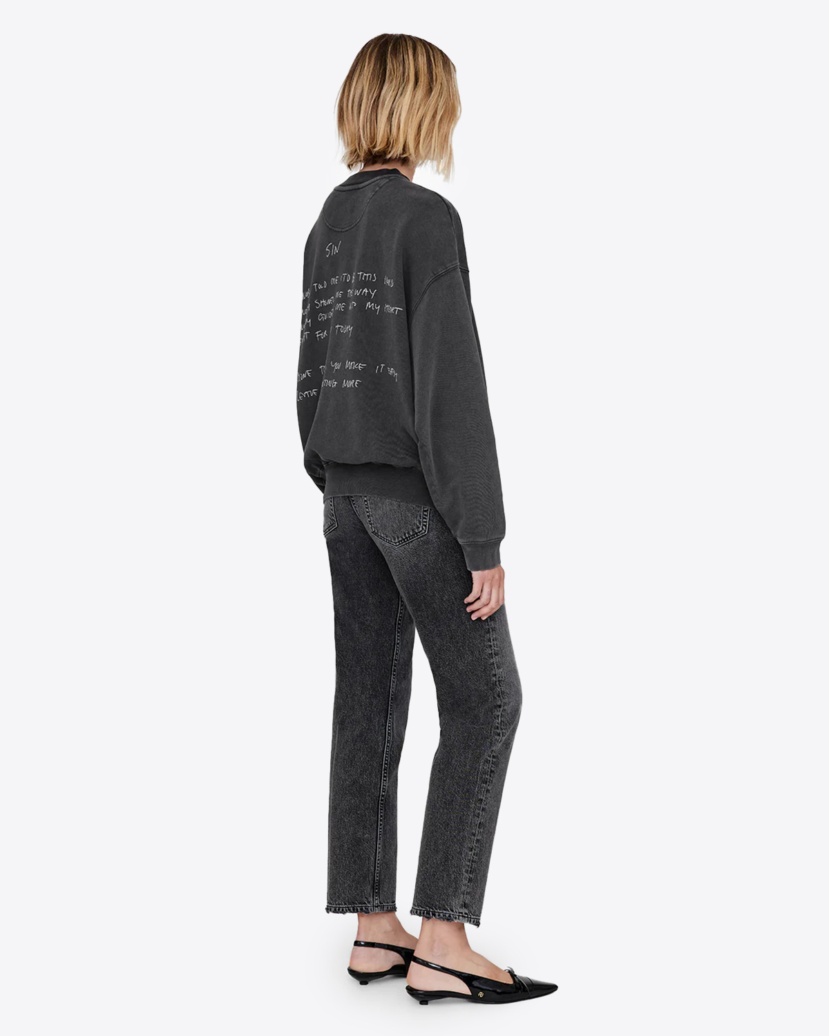 Sweatshirt manches longues Jaci Lyrics Anine Bing en coton noir délavé. Vue porté dos. 