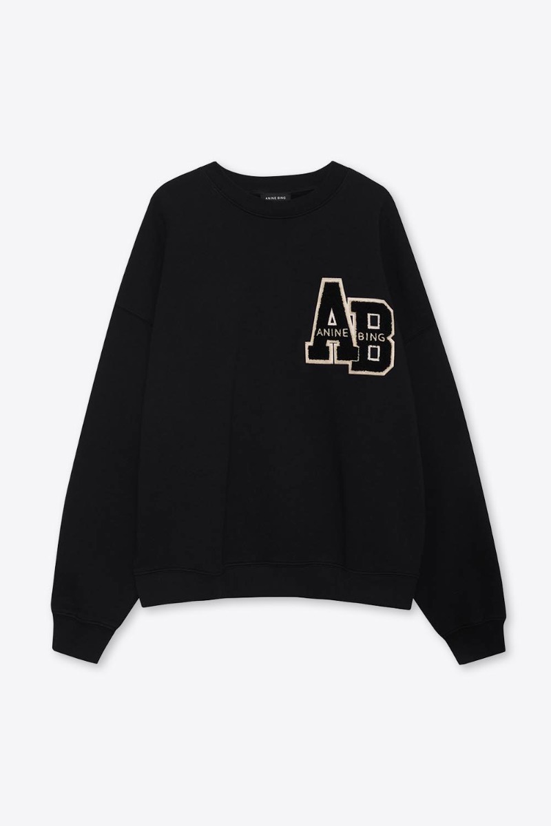Sweatshirt oversize Miles Letterman Anine Bing en coton noir logo &laquo; ANINE BING &raquo; sur la poitrine, vu de face.