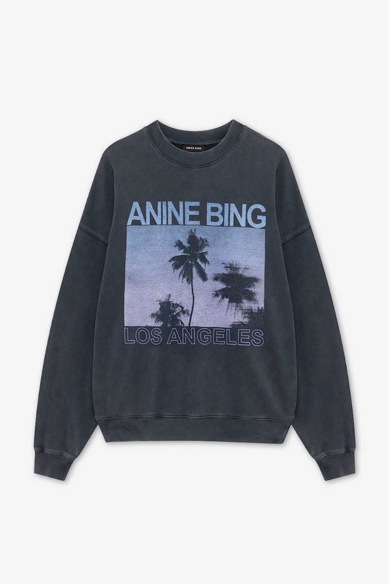 Sweat-shirt Miles Anine Bing noir avec s&eacute;rigraphie palmiers bleue. Vue de face.