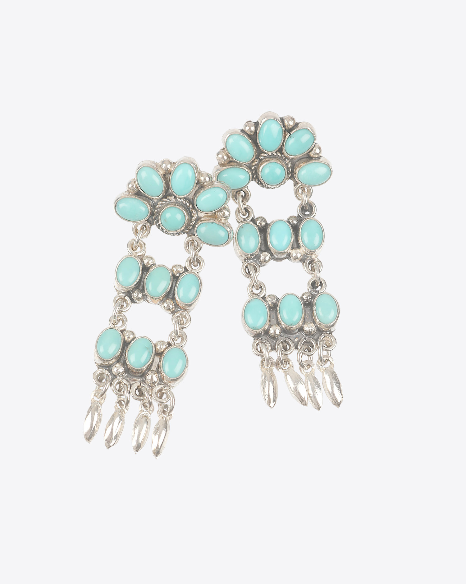 Boucles d'oreilles longues en argent et turquoise Harpo Paris. 