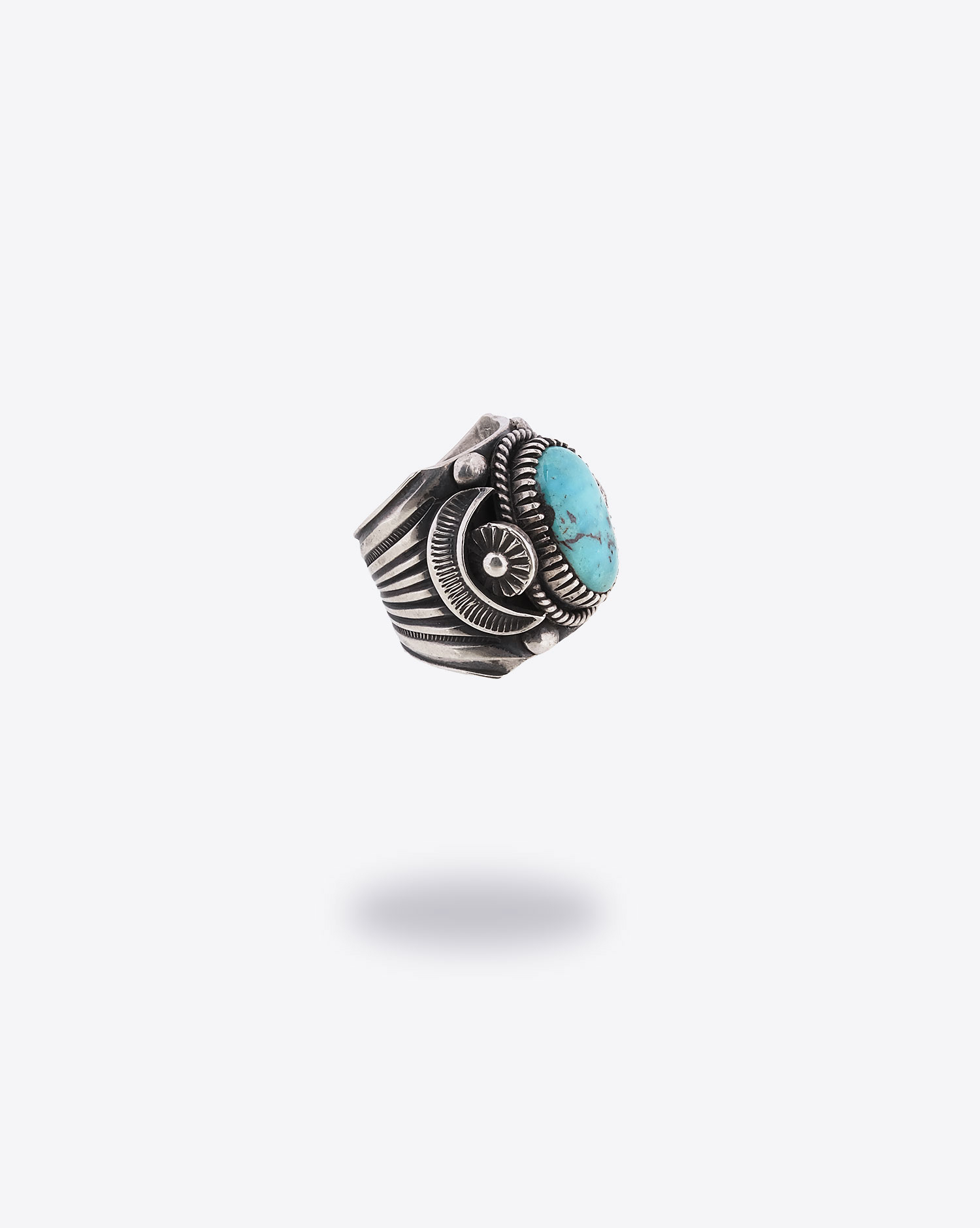 Produit Bague Delbert Gordon Harpo avec pierre turquoise.  Vue profil. 