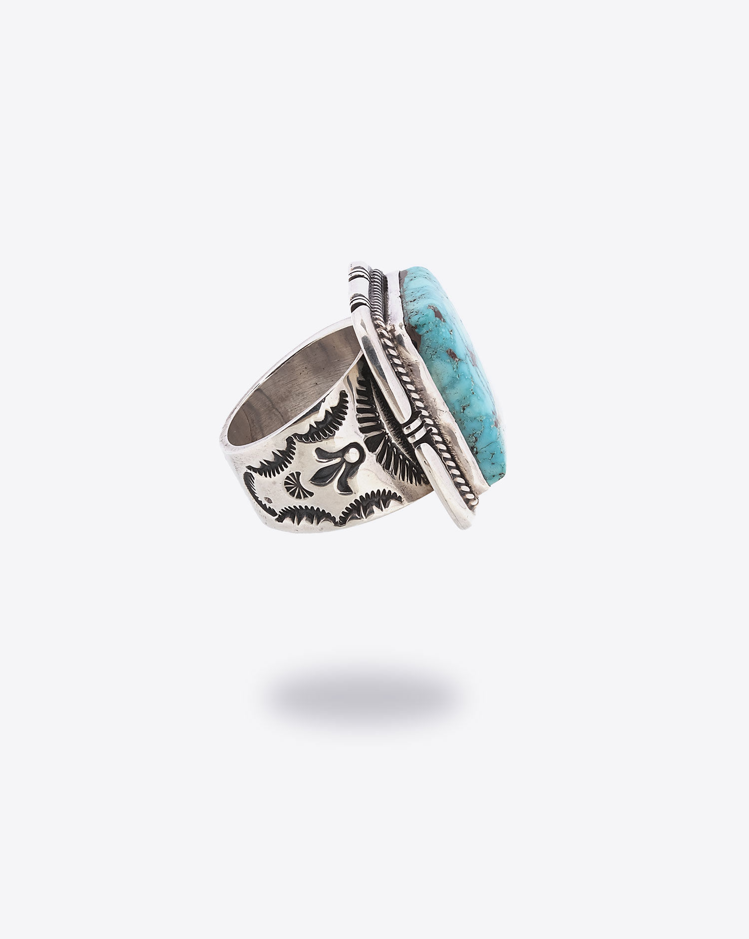 Produit Bague E.Charley Harpo avec une pierre turquoise carré. 
