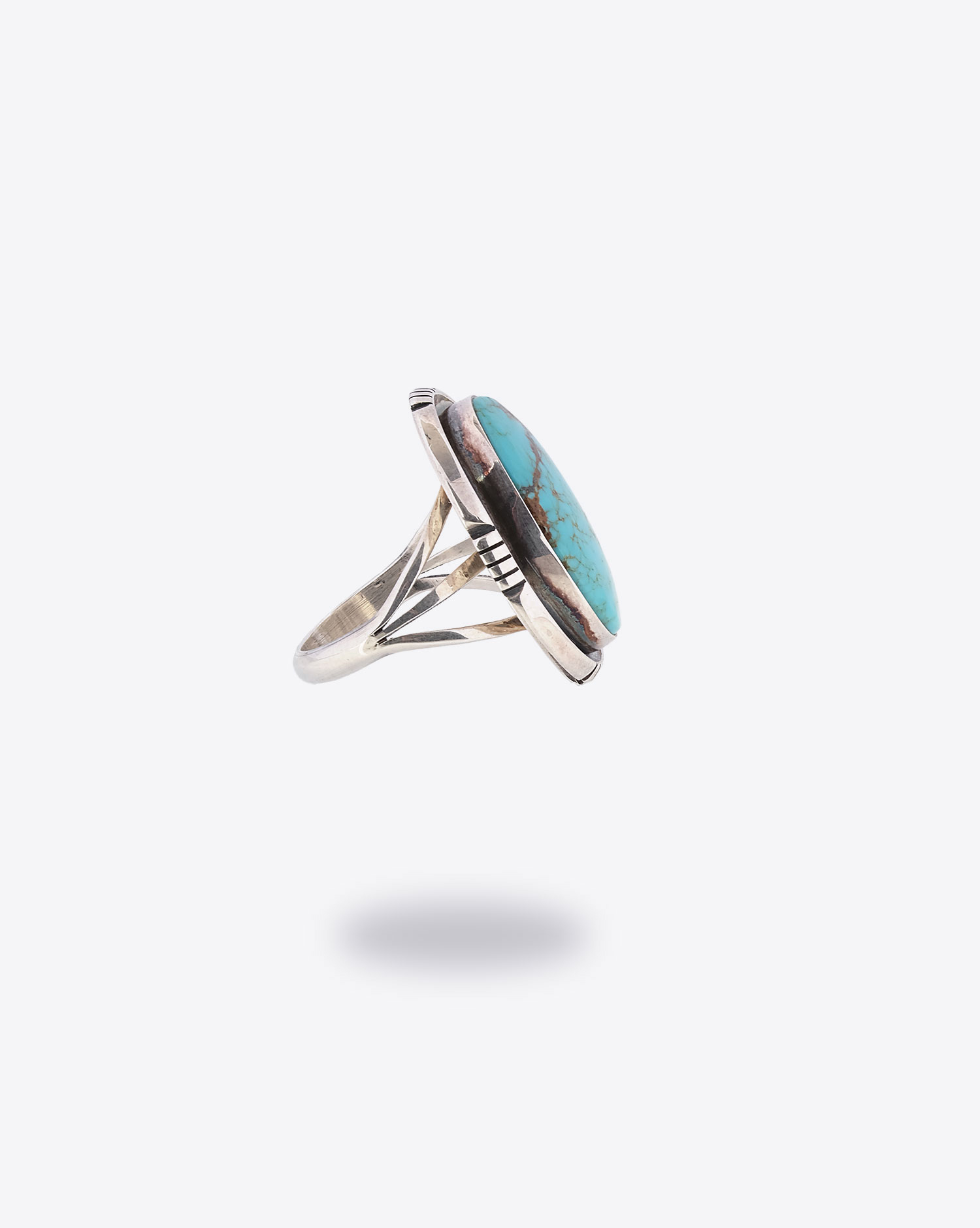 Produit Bague J.Begay Harpo en argent massif avec pierre turquoise. 