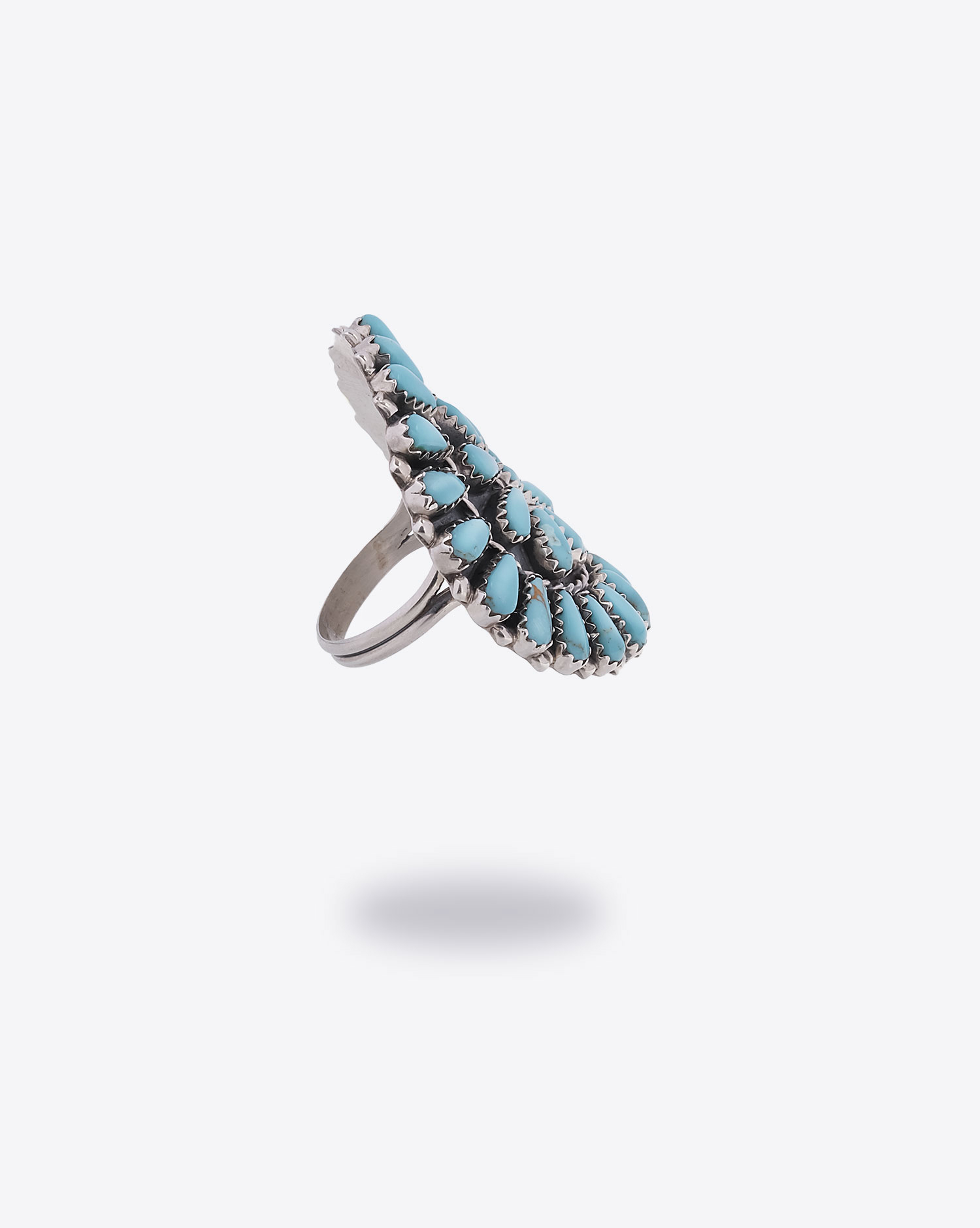 Produit Bague M.B Navajo Harpo en forme de fleurs avec pierres turquoises. Vue profil. 