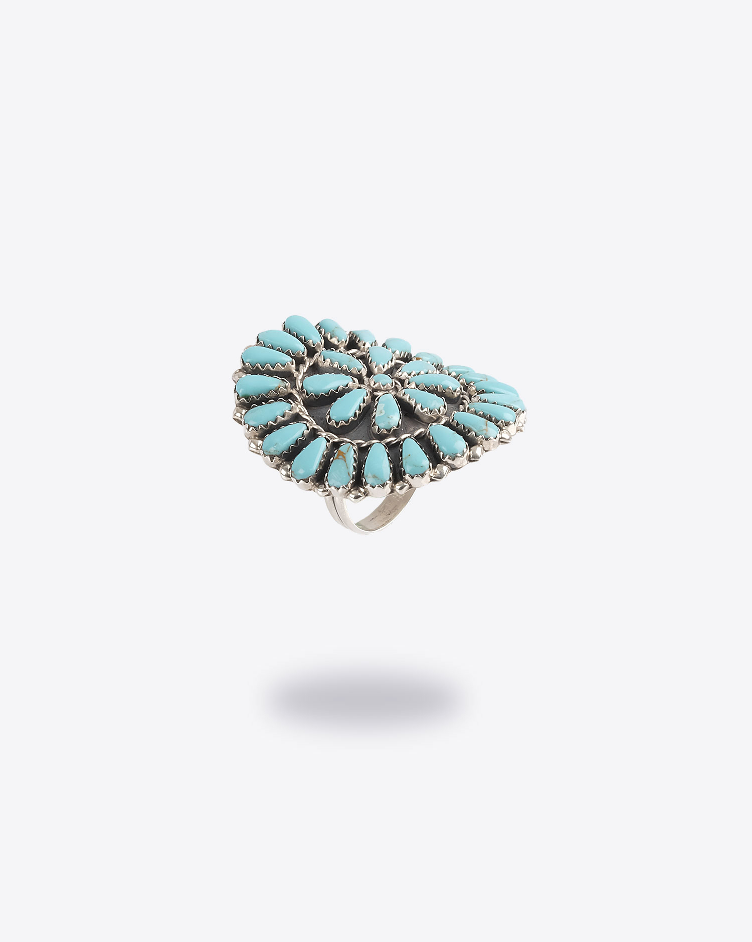 Produit Bague M.B Navajo Harpo en forme de fleurs avec pierres turquoises. 