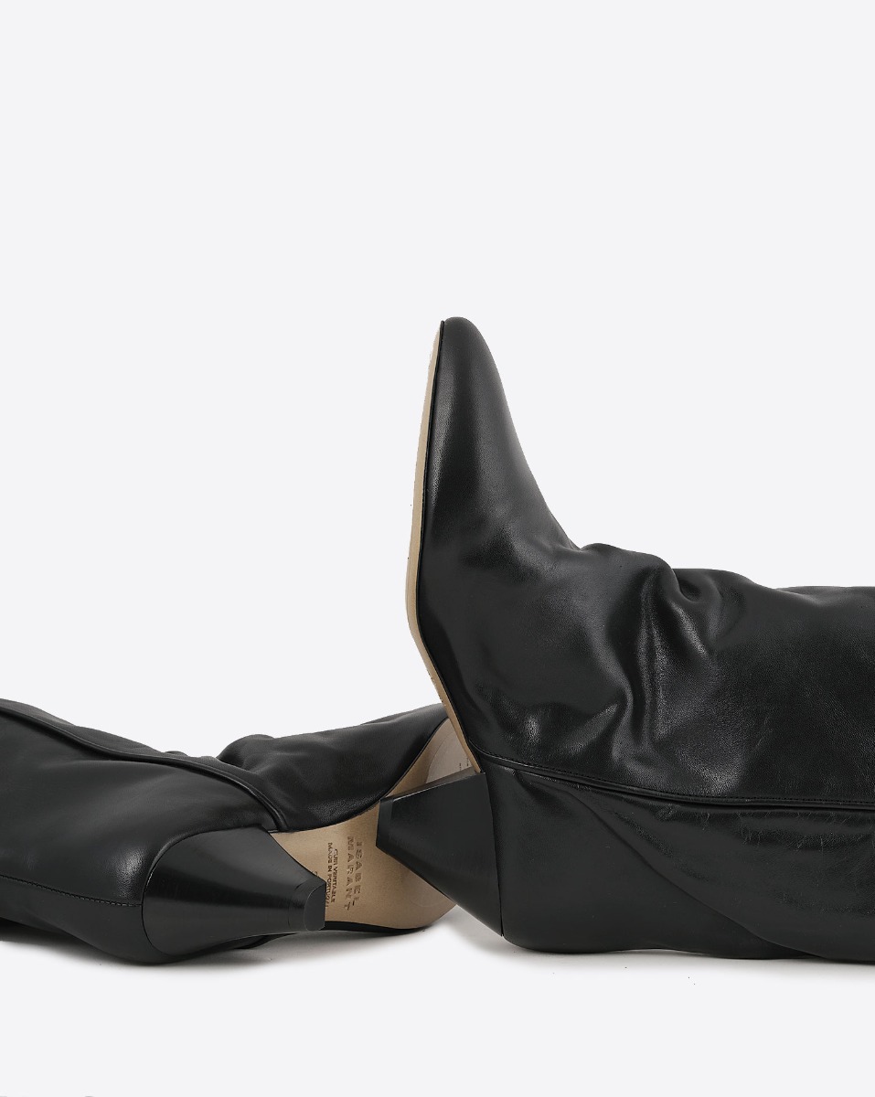 Bottes Elita Isabel Marant en cuir lisse noir. Détail dessous de la semelle en cuir.