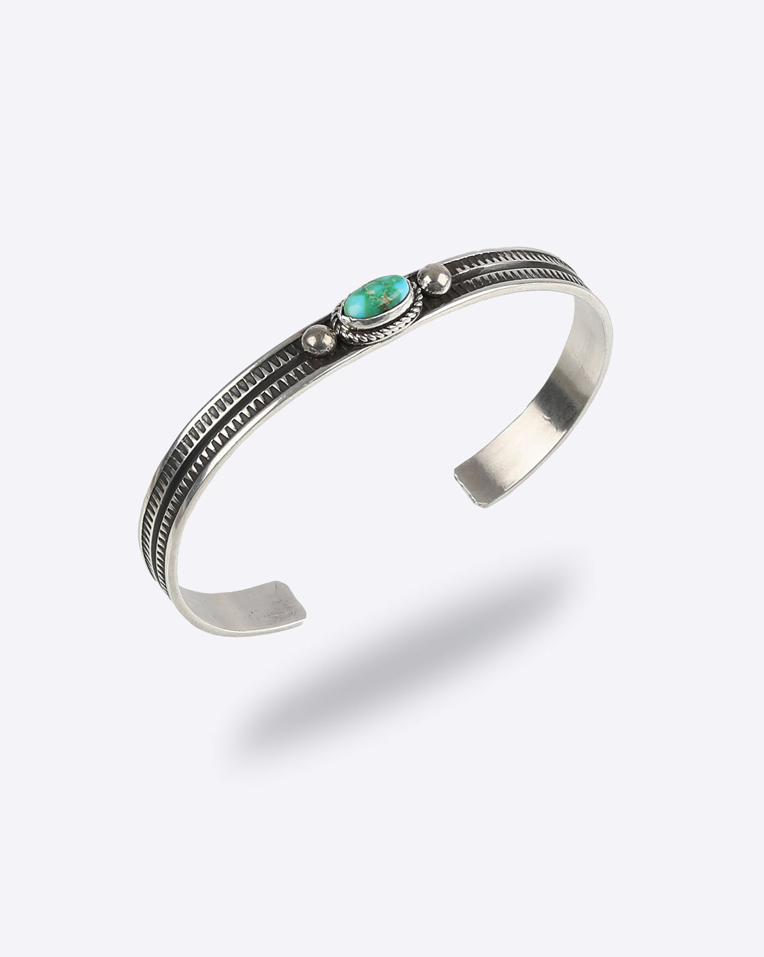 Bracelet Homme en argent ciselé et une turquoise A.Jake Harpo Paris.  