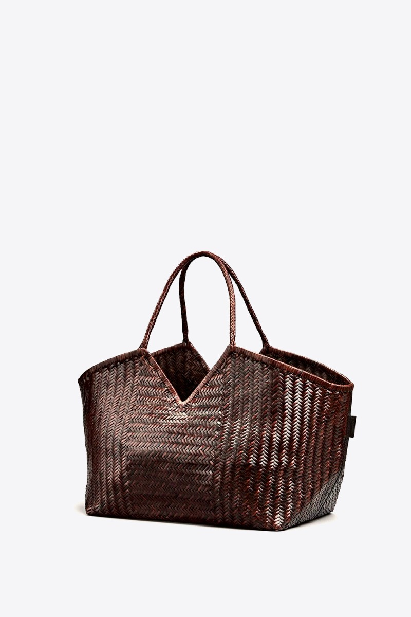 Sac cabas Humi XL Cala Jade en cuir tress&eacute; Umber (marron tr&egrave;s fonc&eacute;). Vue de profil.