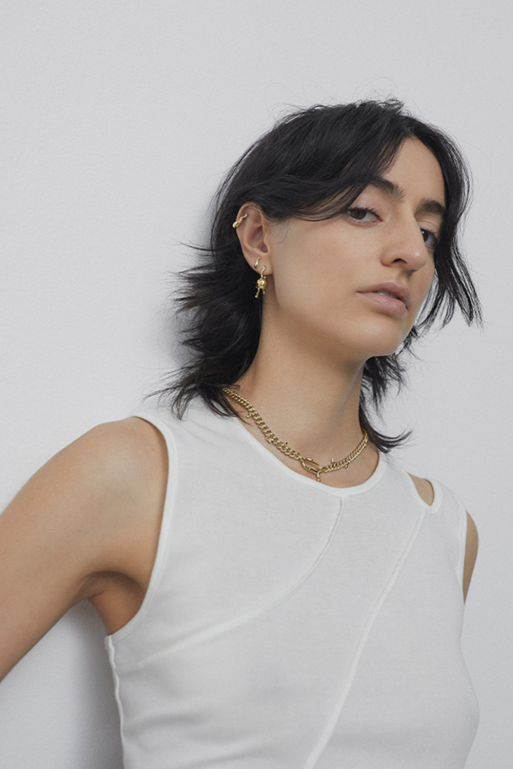 Produit Collier chaine Berline Maria Black en argent plaqué or. 
