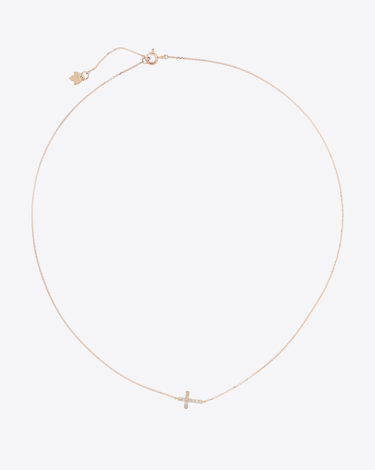 Collier Croix Feidt en Or jaune et saphirs blancs. 
