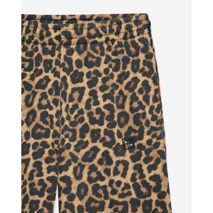 Pantalon de jogging Karter Anine Bing en coton imprimé léopard. Détail de la ceinture élastiquée.