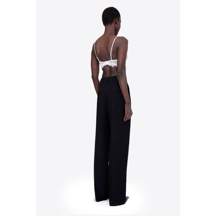 Soutien-gorge triangle en dentelle ivoire Anine Bing. Porté dos.