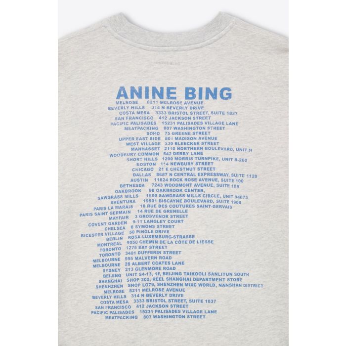 Sweat-shirt Miles Wave Anine Bing en coton gris clair chiné sérigraphie bleue. Détail de la sérigraphie dans le dos. Adresses des boutiques Anine Bing dans le monde.