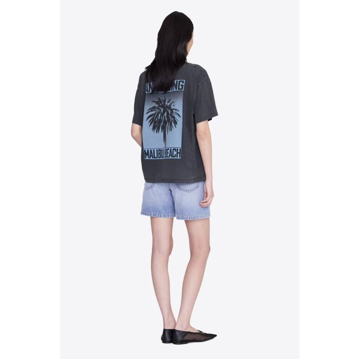 Tee-shirt Cade Palm Anine Bing en coton noir délavé, sérigraphie palmier « ANINE BING MALIBU BEACH » porté de dos.