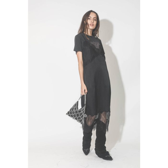 Bottes Santiags en cuir suédé noir R13. Porté avec un mini-sac  et en cuir et chaine.