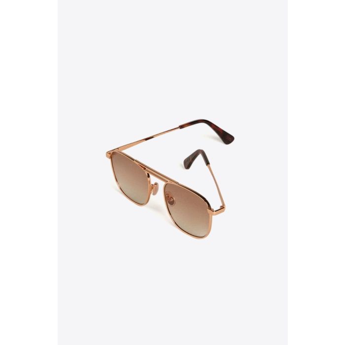 Lunettes de soleil Roger Golden Goose unisexe. Montures aviateur en métal doré effet or rose. Vue de profil.