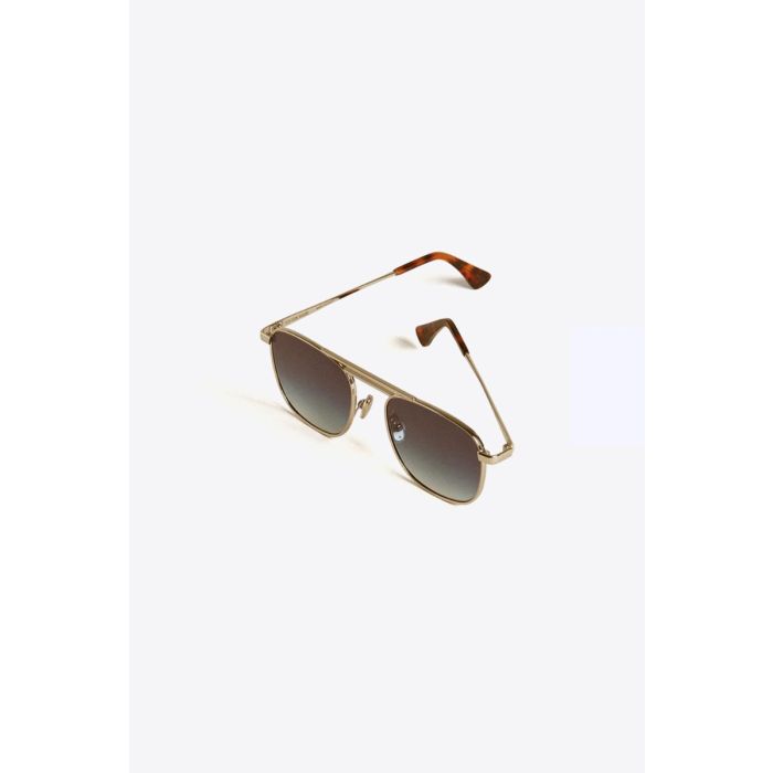 Lunettes de soleil aviateur Roger Golden Goose unisexe avec monture argentée et verres bleus. Vue de profil.