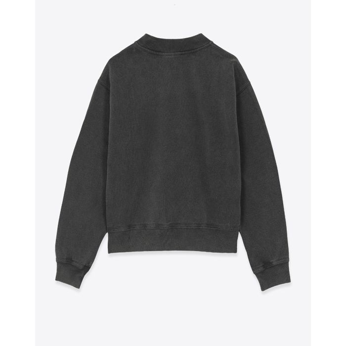 Sweatshirt court Simony Isabel Marant Etoile en coton noir délavé. Encolure boutonnées et logo brodé « Marant » ton sur ton sur la poitrine. Vue de dos.