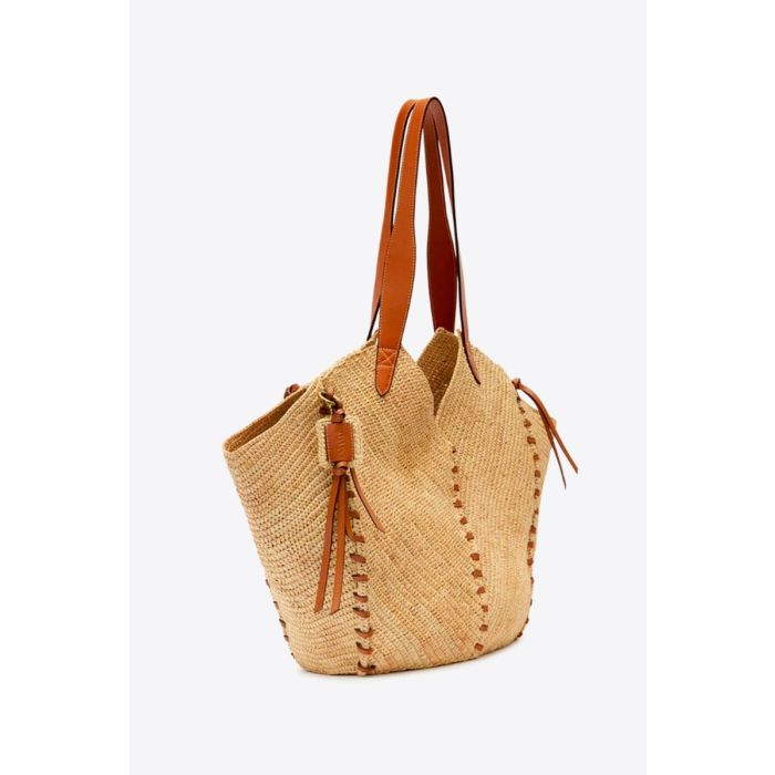 Panier en osier Tampa Isabel Marant en raphia naturel et cuir cognac, vu de profil.
