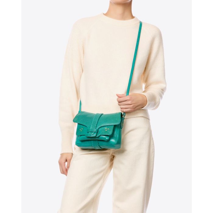Sac Harry S Jérôme Dreyfuss en cuir de chèvre turquoise, porté croisé.