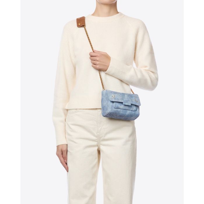 Sac Lulu S Jérôme Dreyfuss en cuir suédé jeans délavé, porté croisé.