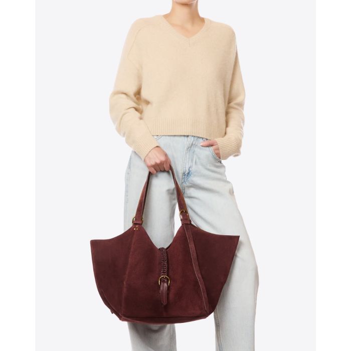 Sac cabas Joseph M Jérôme Dreyfuss en cuir suédé brûlé, porté à la main.