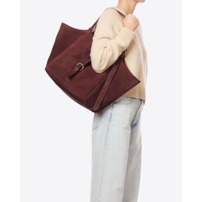 Sac cabas Joseph M Jérôme Dreyfuss en cuir suédé brûlé, porté à l'épaule.