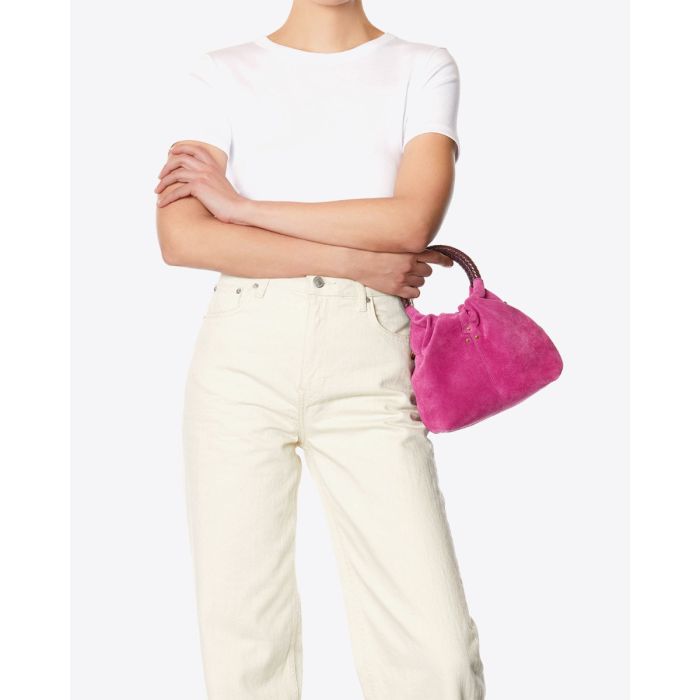 Sac bourse Gordi S Jérôme Dreyfuss en cuir suédé rose orchidée porté main.