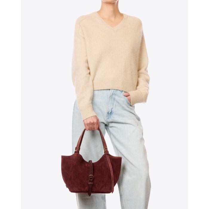 Sac cabas Joseph S Jérôme Dreyfuss en cuir suédé brûlé, porté à la main.