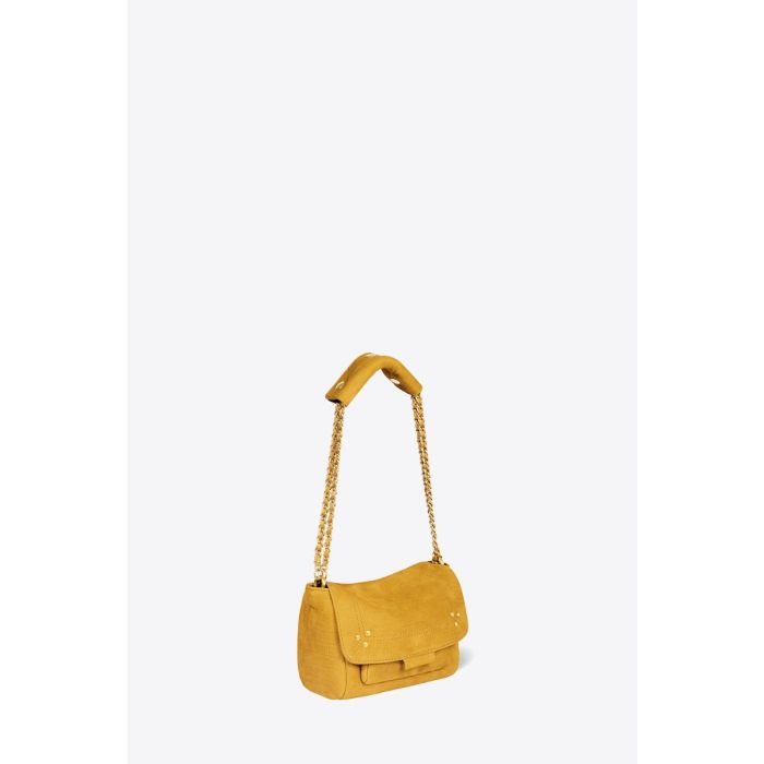 Sac Lulu S Jérôme Dreyfuss en cuir de taurillon imprimé croco moutarde. Vue de profil avec la bandoulière courte. 