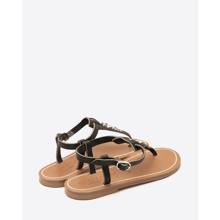 Sandales Coriolan K.Jacques x HTC en cuir noir, ornées de clous métalliques argentés et de pierres colorées formant une fleur, fabrication artisanale française. Vue de dos.