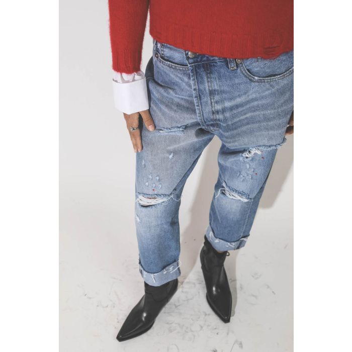 Jean Crossover bleu ciel déchiré delavage Emory r13. Détail déchirures et taches de peinture. 