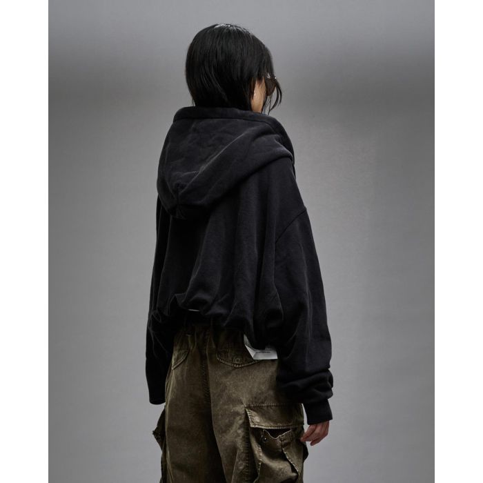 Sweat-shirt zip à capuche noir oversize Balloon zip-up Hoodie R13. Porté fermé de profil dos.
