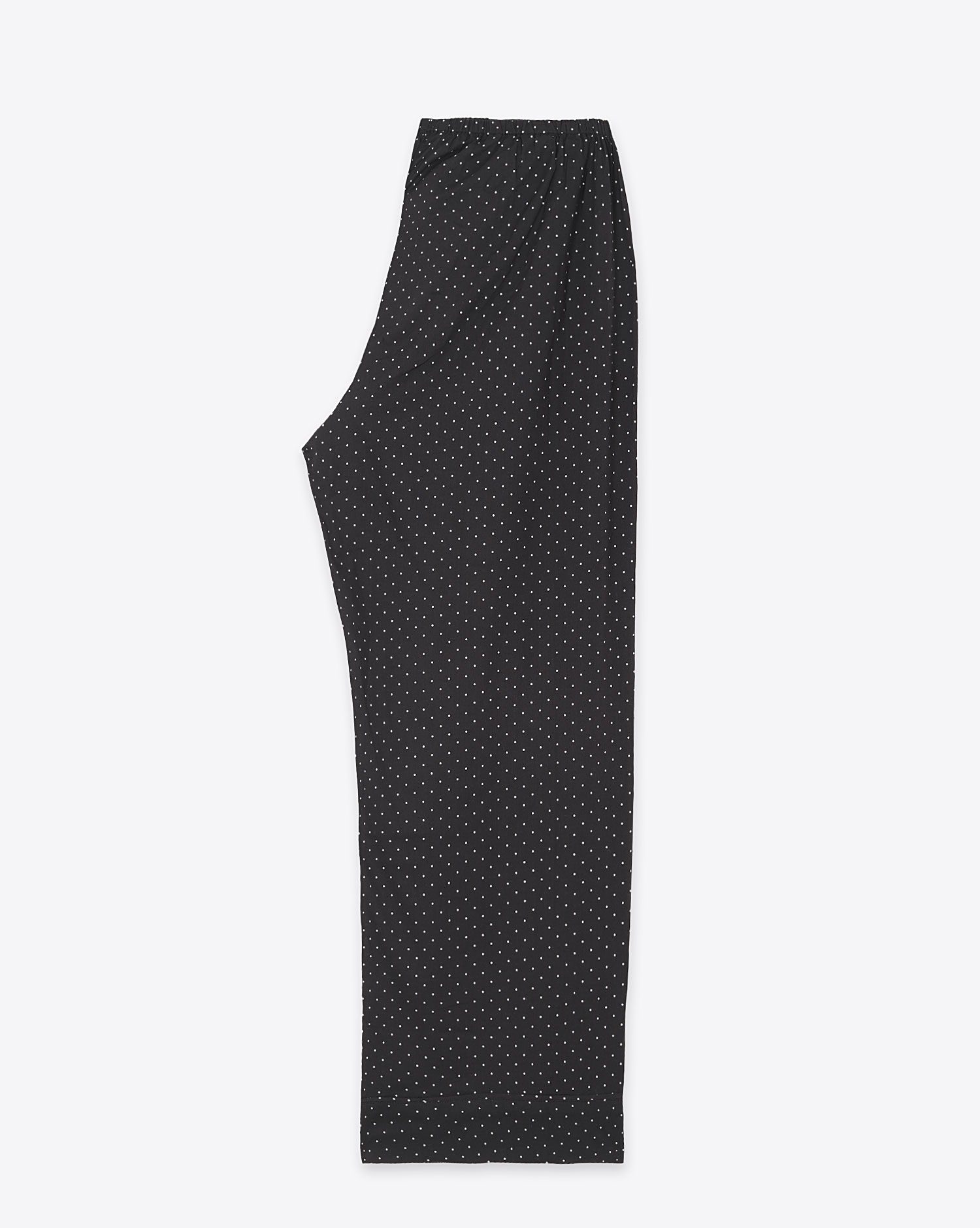 Produit Pantalon Easy Sleep Isabel Marant Etoile en coton noir à pois blancs. Vue profil.