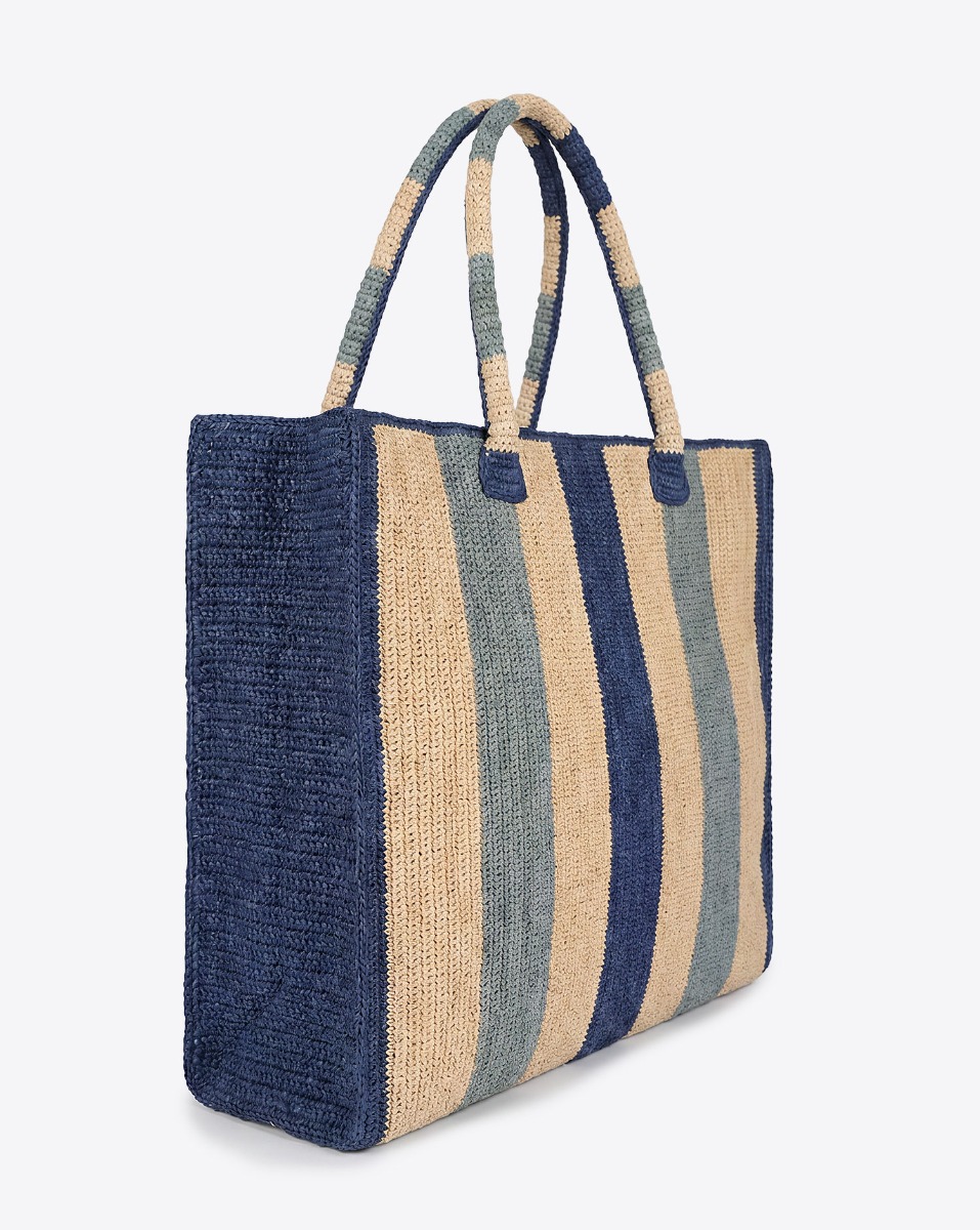 Cabas Raffia Weekender Cabarita Gabriele Frantzen en raphia ray&eacute; bleu et beige. Vu de profil.