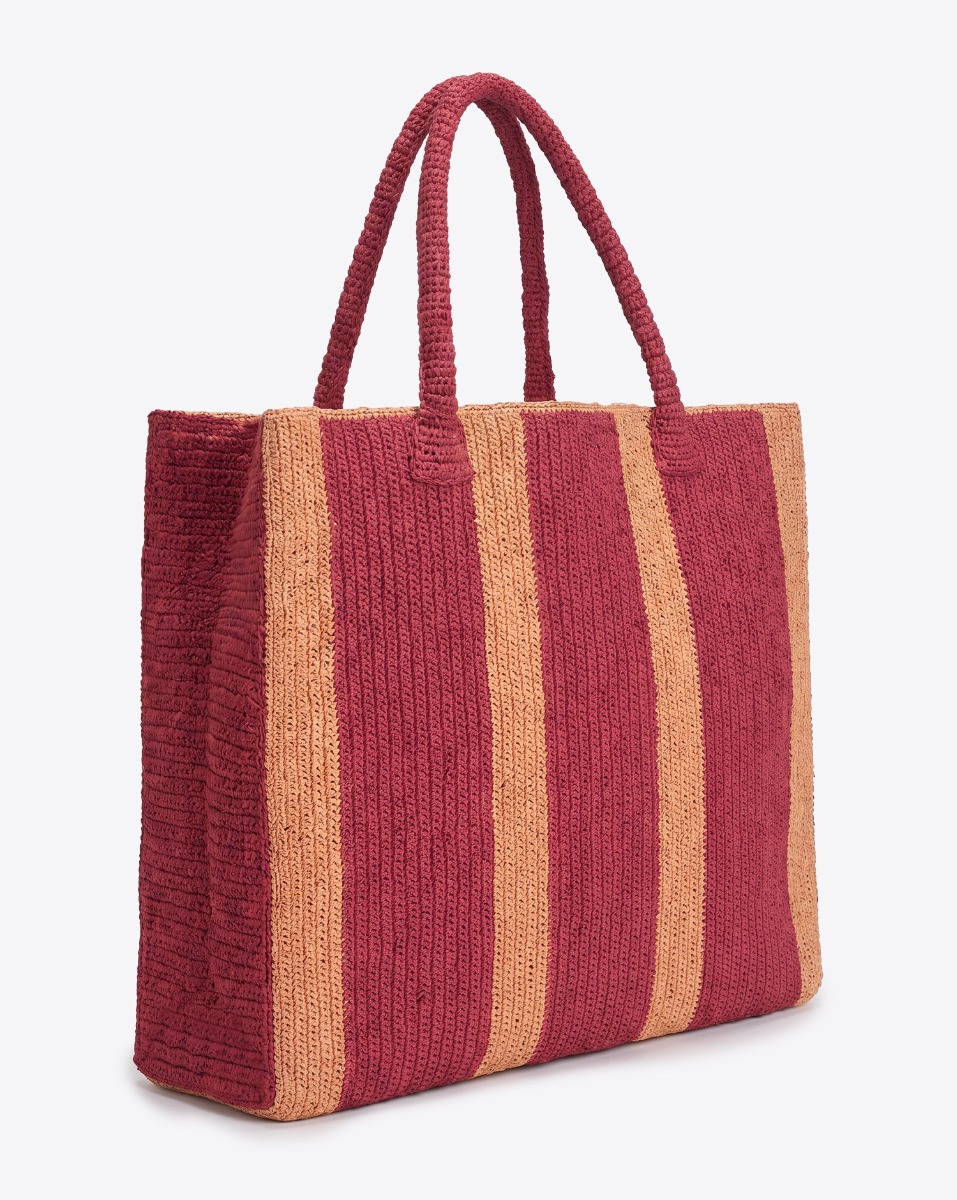 Cabas Raffia Weekender Melon Mix Gabriele Frantzen en raphia ray&eacute; rouge et orange. Vu de profil.