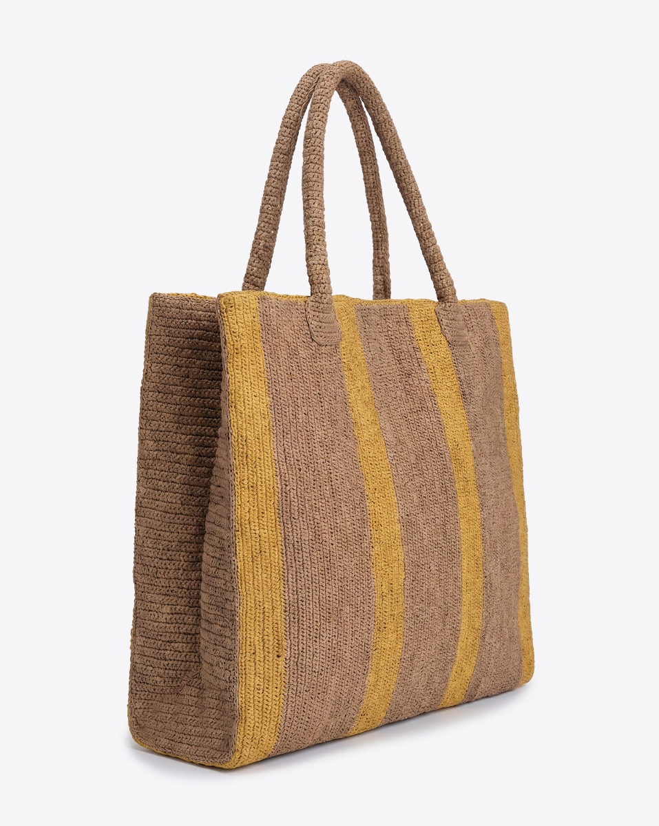 Grand Cabas Raffia Weekender Sand Sunshine Gabriele Frantzen en raphia ray&eacute; beige et jaune. Vu de profil.