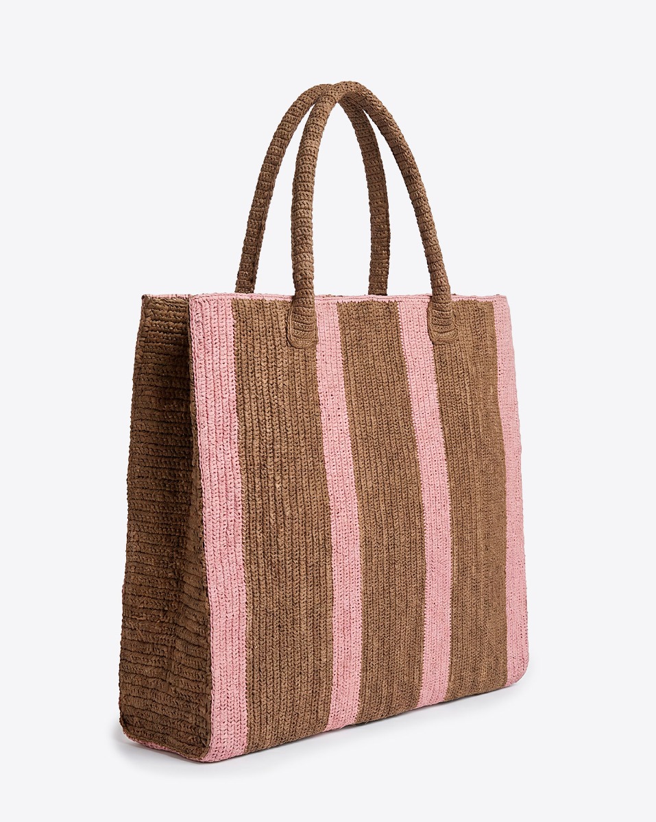 Grand cabas Raffia Weekender Sugar Rose Gabriele Frantzen en raphia rayé marron et rose, vu de profil.