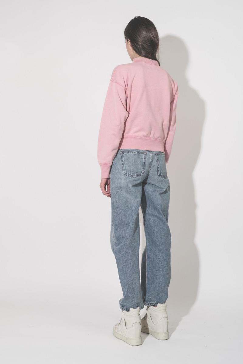 Baskets montantes compensées IM3 Isabel Marant en cuir suédé écru, portées de dos.