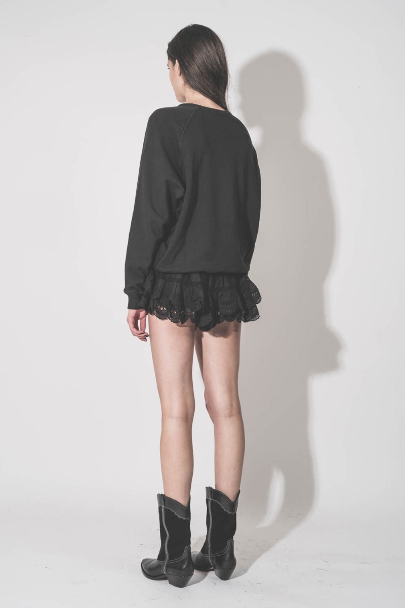 Short Puria Isabel Marant &Eacute;toile en voile de coton et en dentelle noire, port&eacute; de dos.