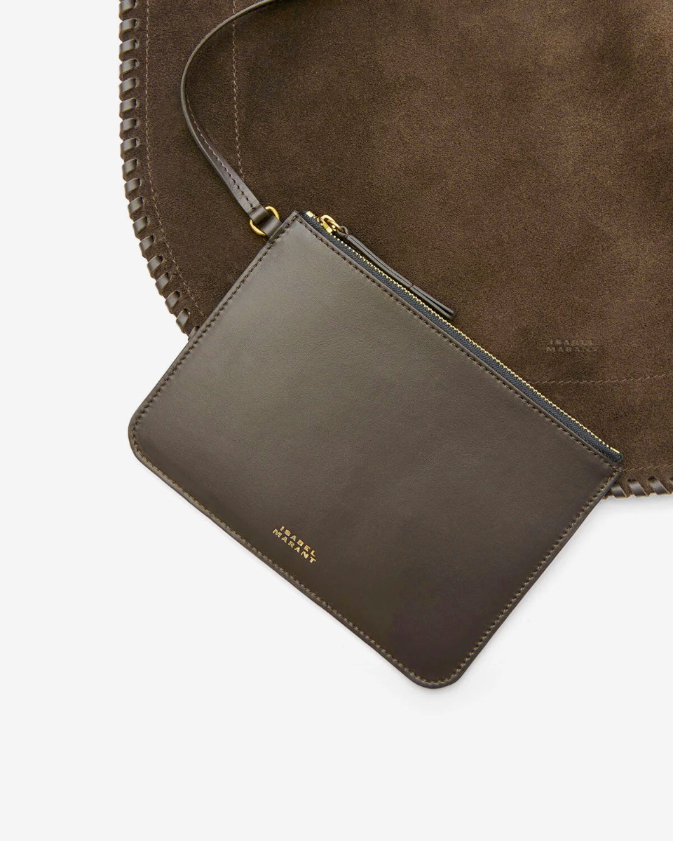 Sac Hoskan Hobo Soft Isabel Marant en cuir suédé bronze tressé. Détail de la pochette en cuir lisse à l'intérieur. 