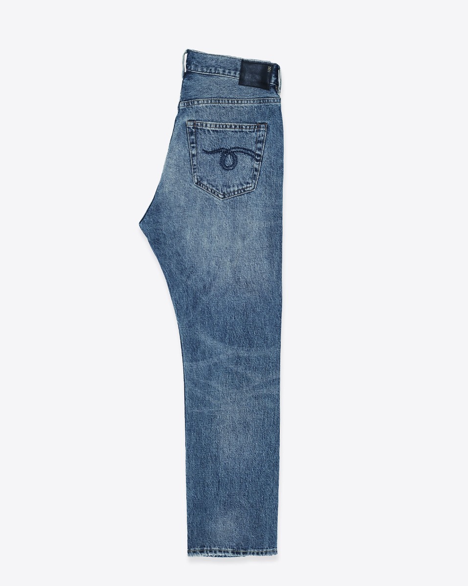Produit Jean crossover R13 en denim bleu déchiré Léo Blue. Vue de profil.