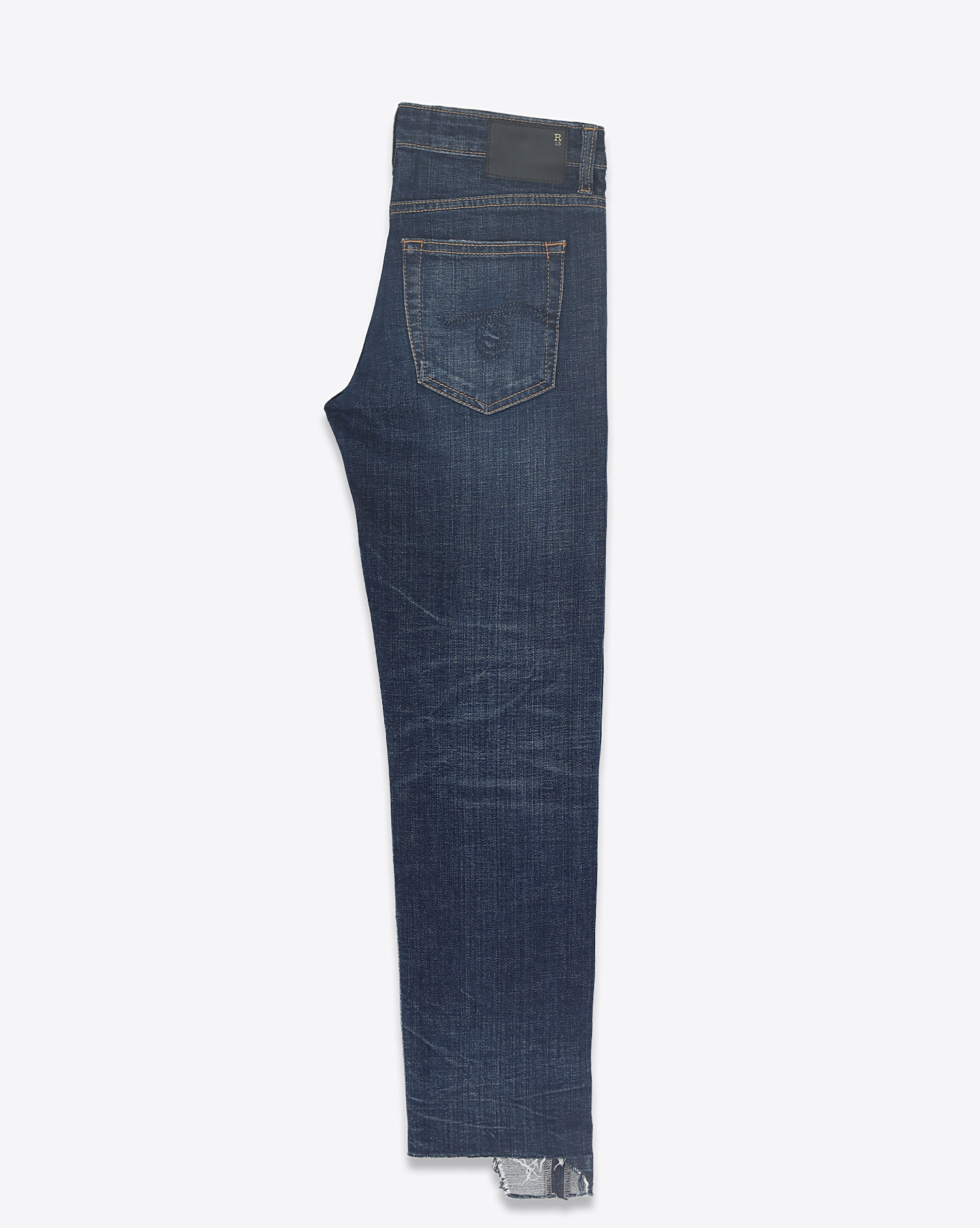 Jeans taille basse jambe droite ourlet déchiré Boy Straight délavage bleu Howell Indigo R13 Denim. Profil.