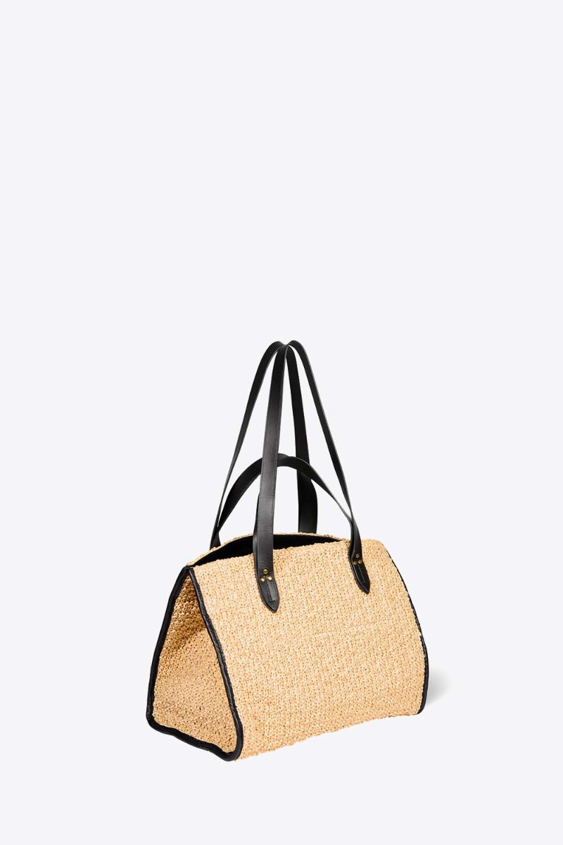 Sac Leon M J&eacute;r&ocirc;me Dreyfuss en raphia naturel, vu de profil.
