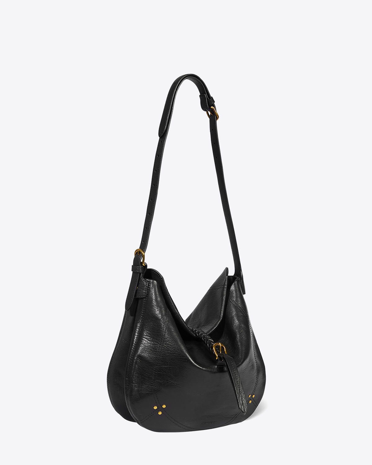 Sac besace en cuir grainé noir Luis Jérôme Dreyfuss. Profil. Porté épaule ou croisé bandoulière longue. 