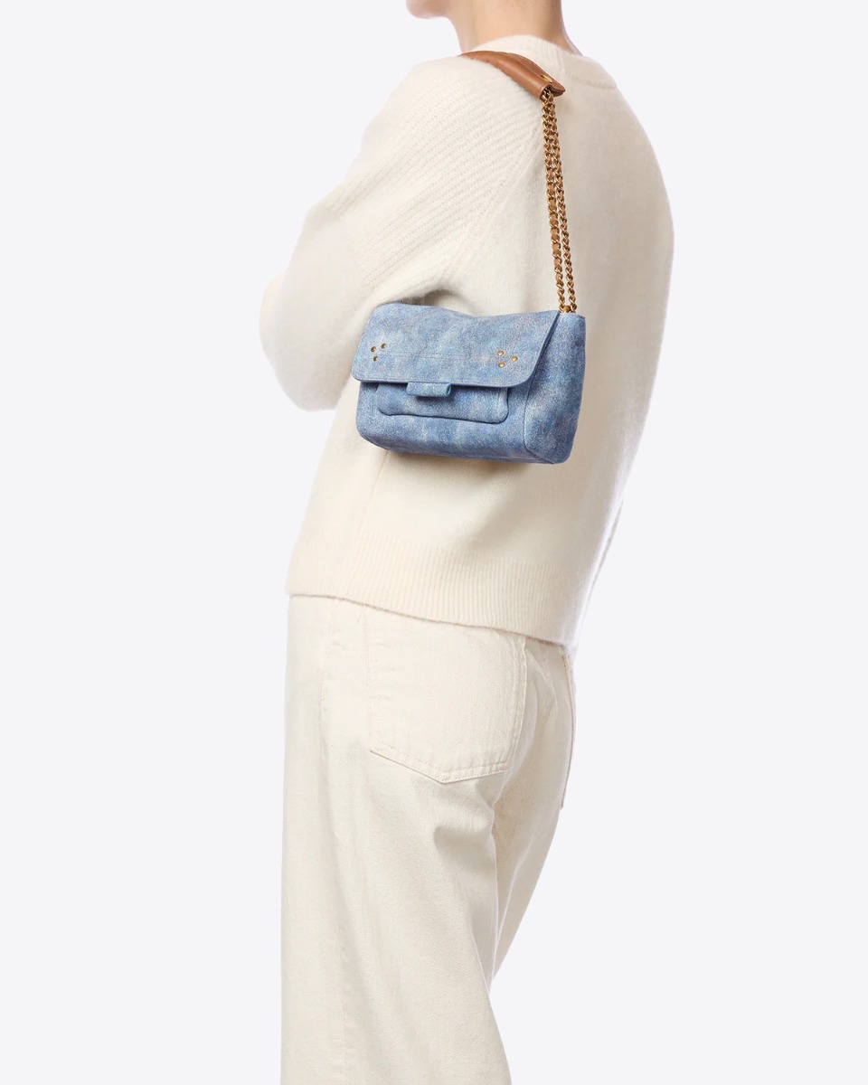 Sac Lulu S J&eacute;r&ocirc;me Dreyfuss en cuir su&eacute;d&eacute; jeans d&eacute;lav&eacute;, port&eacute; &agrave; l'&eacute;paule, bandouli&egrave;re courte.